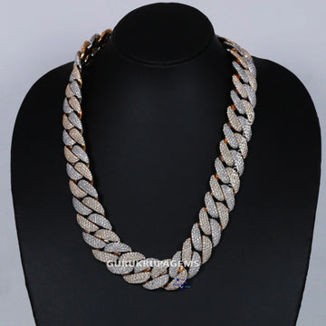 20 inch 20 mm presenting a white and yellow gold Cuban chain showcases VVS clarity Gurukrupa-Gems