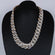 20 inch 20 mm presenting a white and yellow gold Cuban chain showcases VVS clarity Gurukrupa-Gems