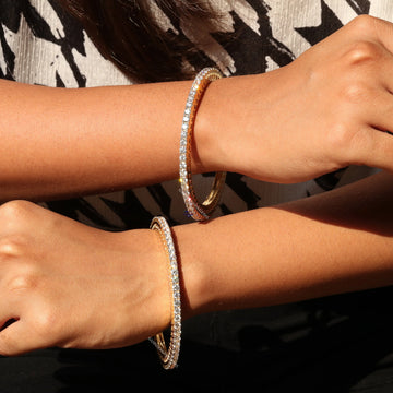 Adorn Your Wrist with Exquisite 14 kt Gold Bangles classy jewelry for women wore at wedding or parties Gurukrupa-Gems