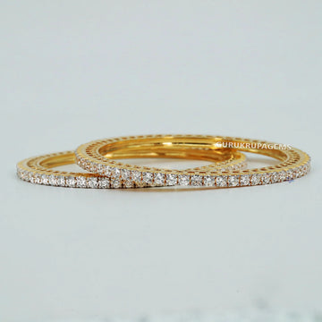 Adorn Your Wrist with Exquisite 14 kt Gold Bangles classy jewelry for women wore at wedding or parties Gurukrupa-Gems