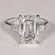 Best selling solitaire diamond ring in 14 kt white gold with vvs clarity diamonds in emerald and tapered baguette Gurukrupa-Gems