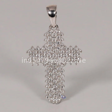Elevate your faith with our stunning cross pendant crafted in 14kt white gold with flawless lab-grown diamonds