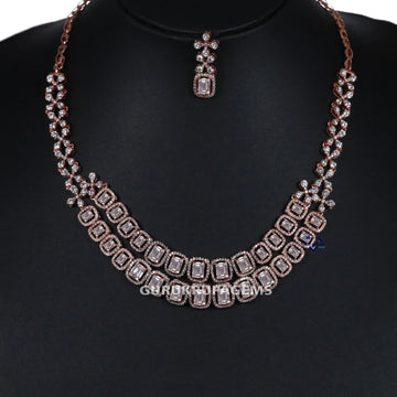 Elevate your neckline accessory in 14 kt rose gold lab grown baguette and round cut diamond necklace Gurukrupa-Gems