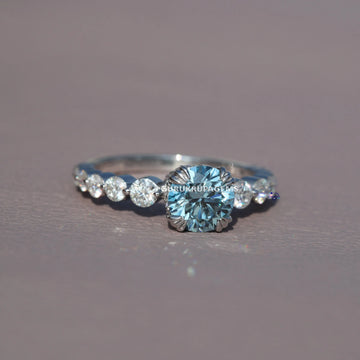 Fine Solitaire Jewelry crafted from 14 kt round cut blue treated diamond ring with vvs clarity Gurukrupa-Gems