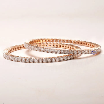 Gleaming Accents for Every Occasion womens 14 kt gold diamond bangles showcases beauty in hands Gurukrupa-Gems