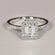 Make a bold impression with this 14 kt white gold emerald round cut ring with VVS clarity Gurukrupa-Gems