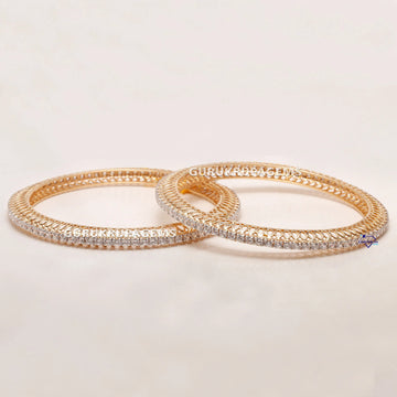 Our Stunning Bangles Collection have 14kt gold indicates lab grown diamonds with VVS clarity Gurukrupa-Gems