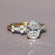 Stylishly crafted this unique oval and round cut diamond ring in 14 kt yellow gold lab grown diamonds Gurukrupa-Gems